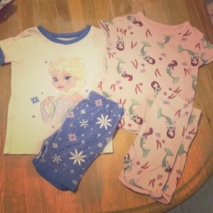 2 sets of pajamas. One is Old Navy, one is Gap.